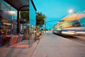 A bus caught during movement causing motion blur in the image